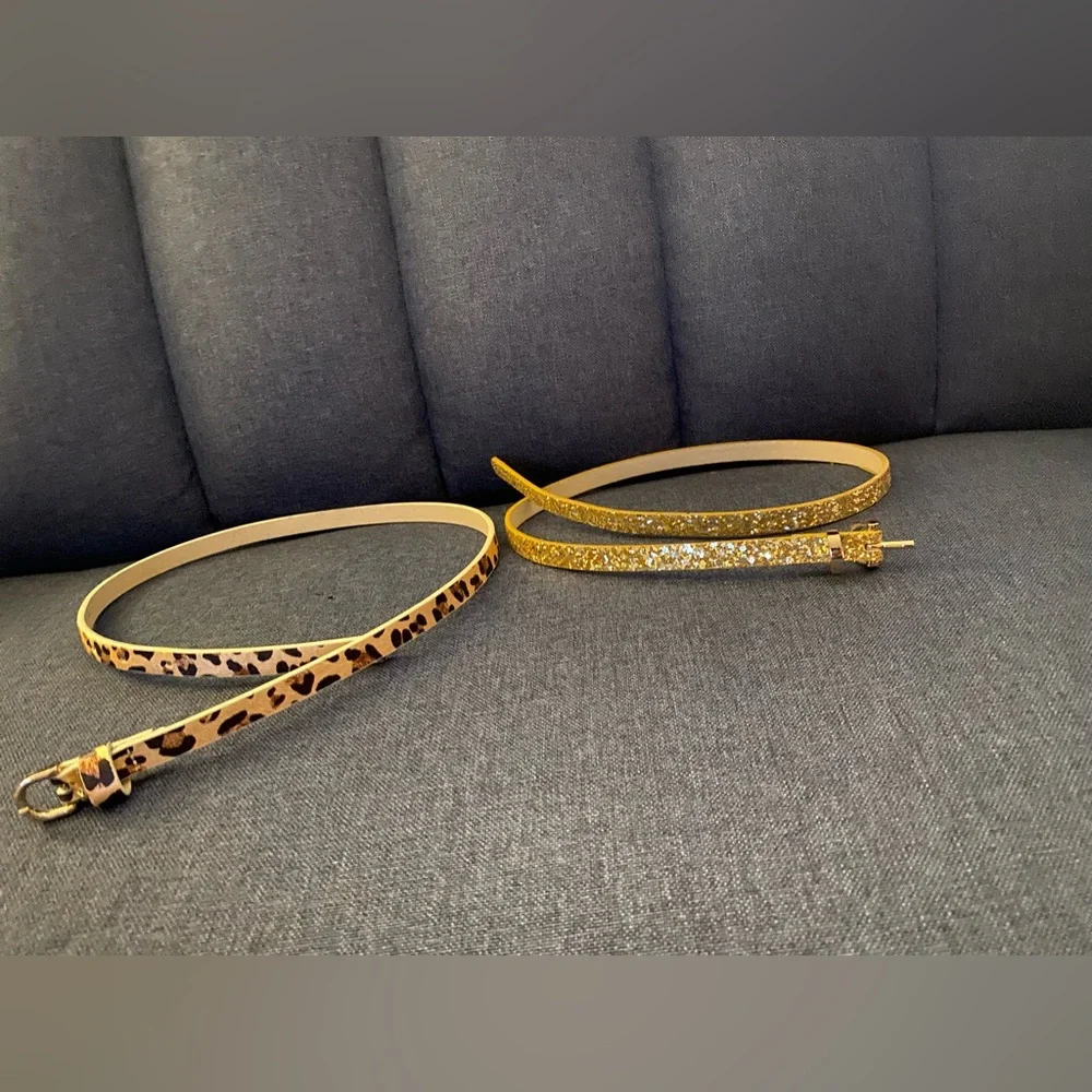 2 girls Old Navy belts one cheetah print and one gold glitter 29”
